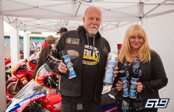 BeMoto BeLotto winners holding Team69 bike cleaning products