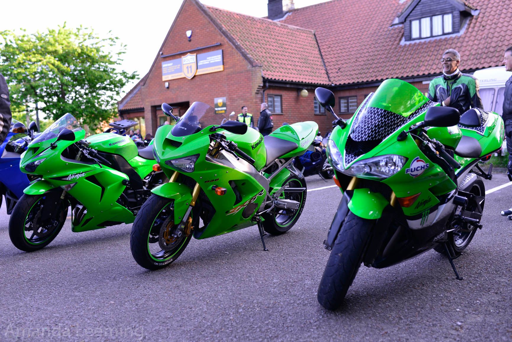 Three Kawasaki Ninjas in the car park of Route 11