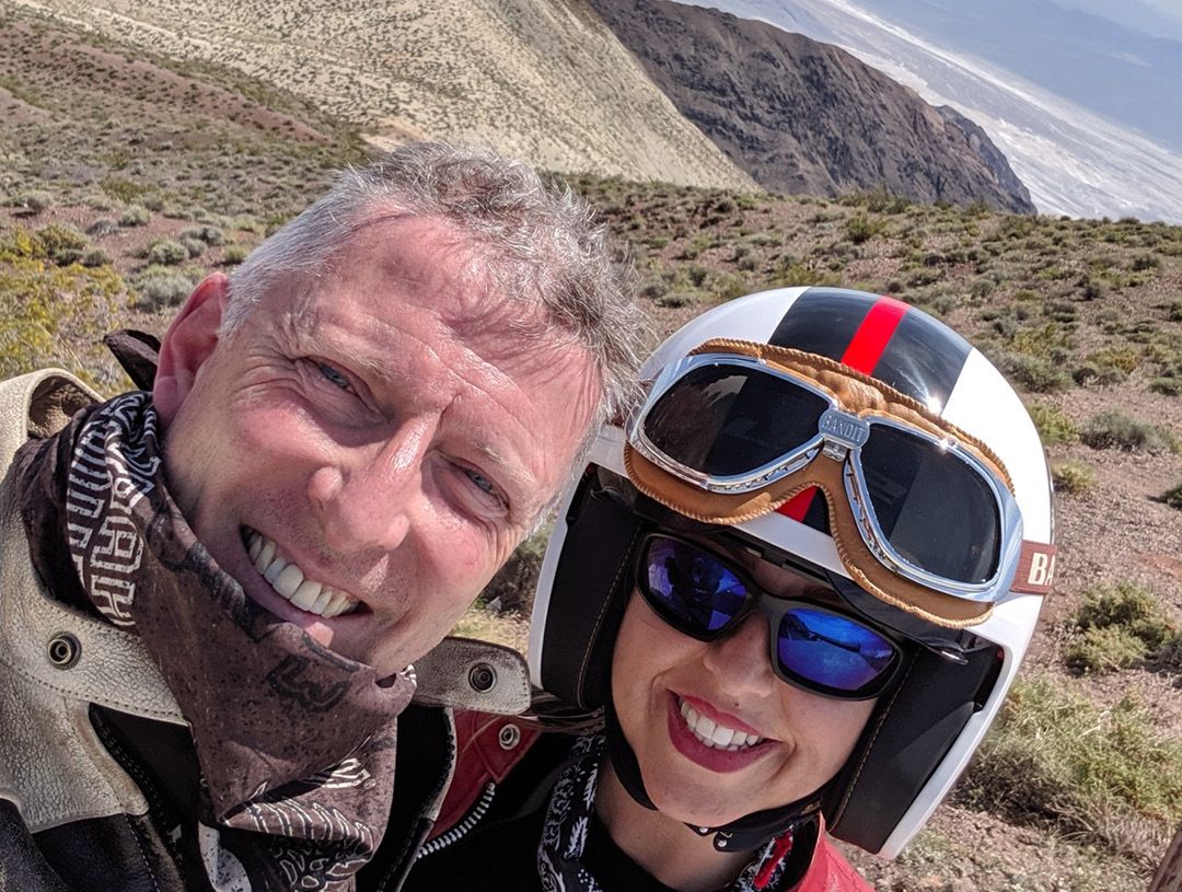 Andy Taylor with partner on a motorbike tour