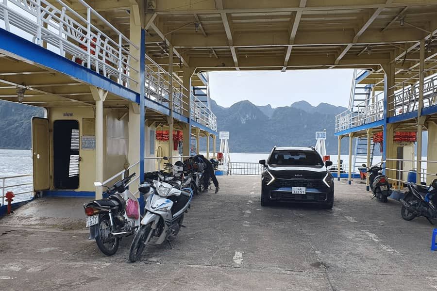 Motorbikes on a river ferry crossing in Vietnam