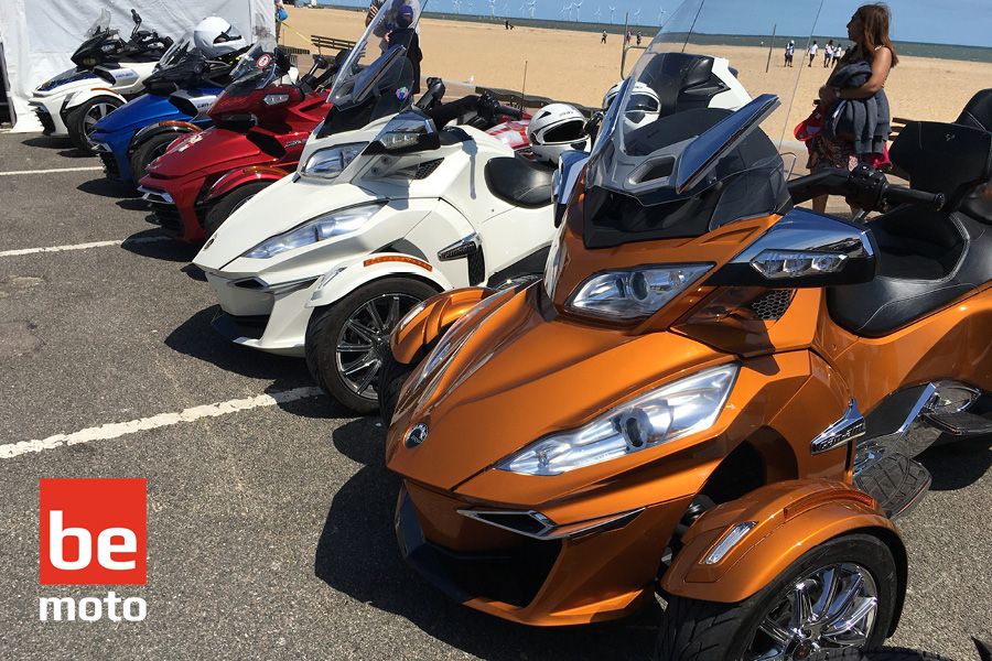 A row of Can-Am Spyder trikes parked up together