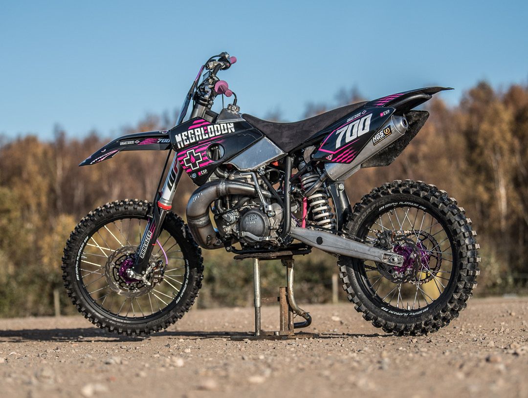 Static photo of the Muc Off branded 700cc 2-stroke Megalodon dirt bike