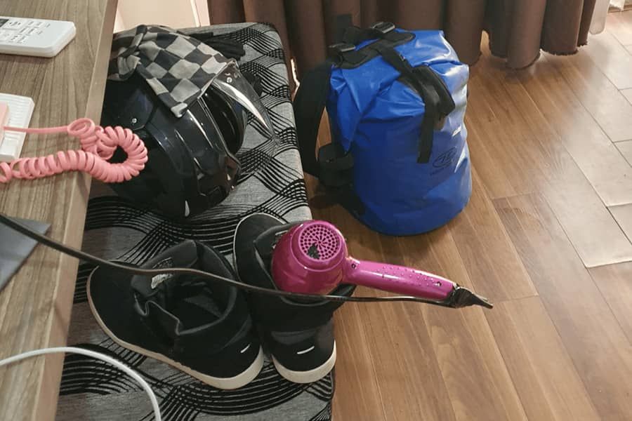 Drying motorcycle boots with a hair dryer