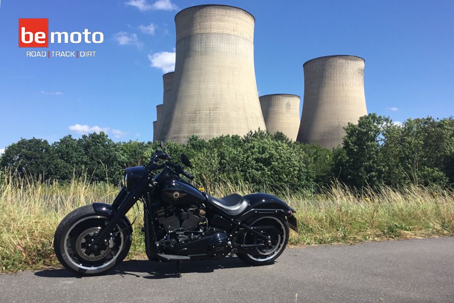 Harley-Davidson Fat Boy Motorcycle near cooling towers