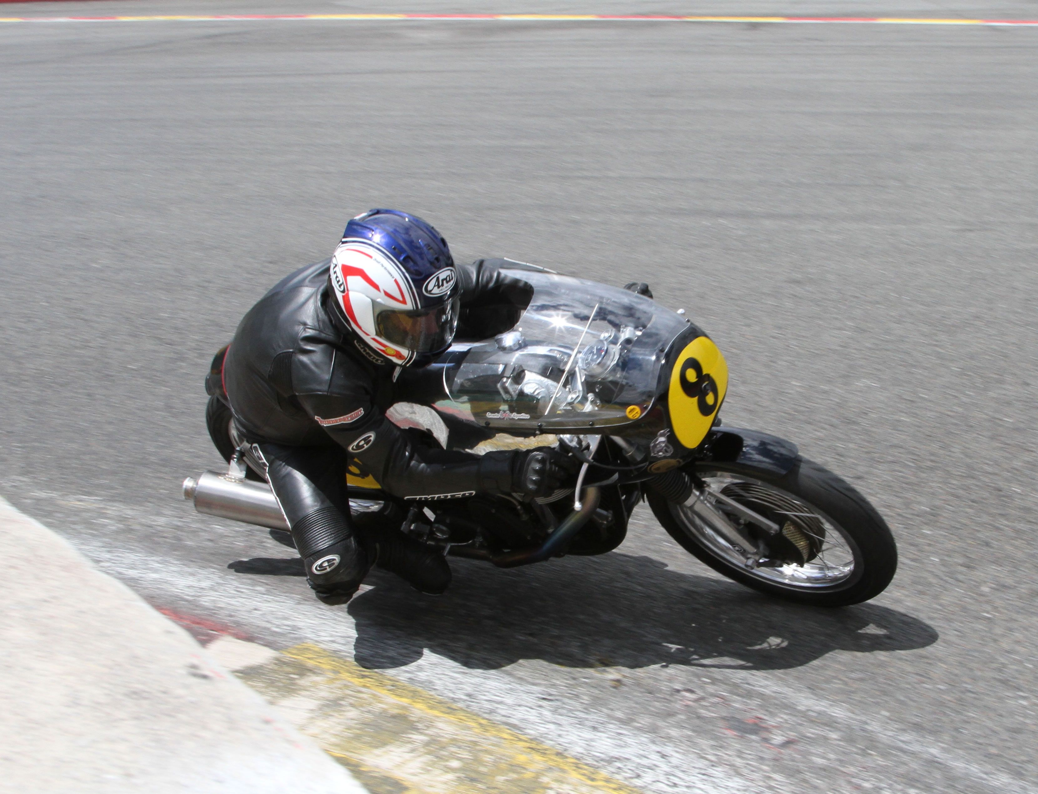 Frank Melling Manx Norton mid corner on track