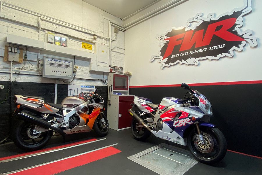 Two Classic Honda Fireblades at FWR Tyres Garage in London