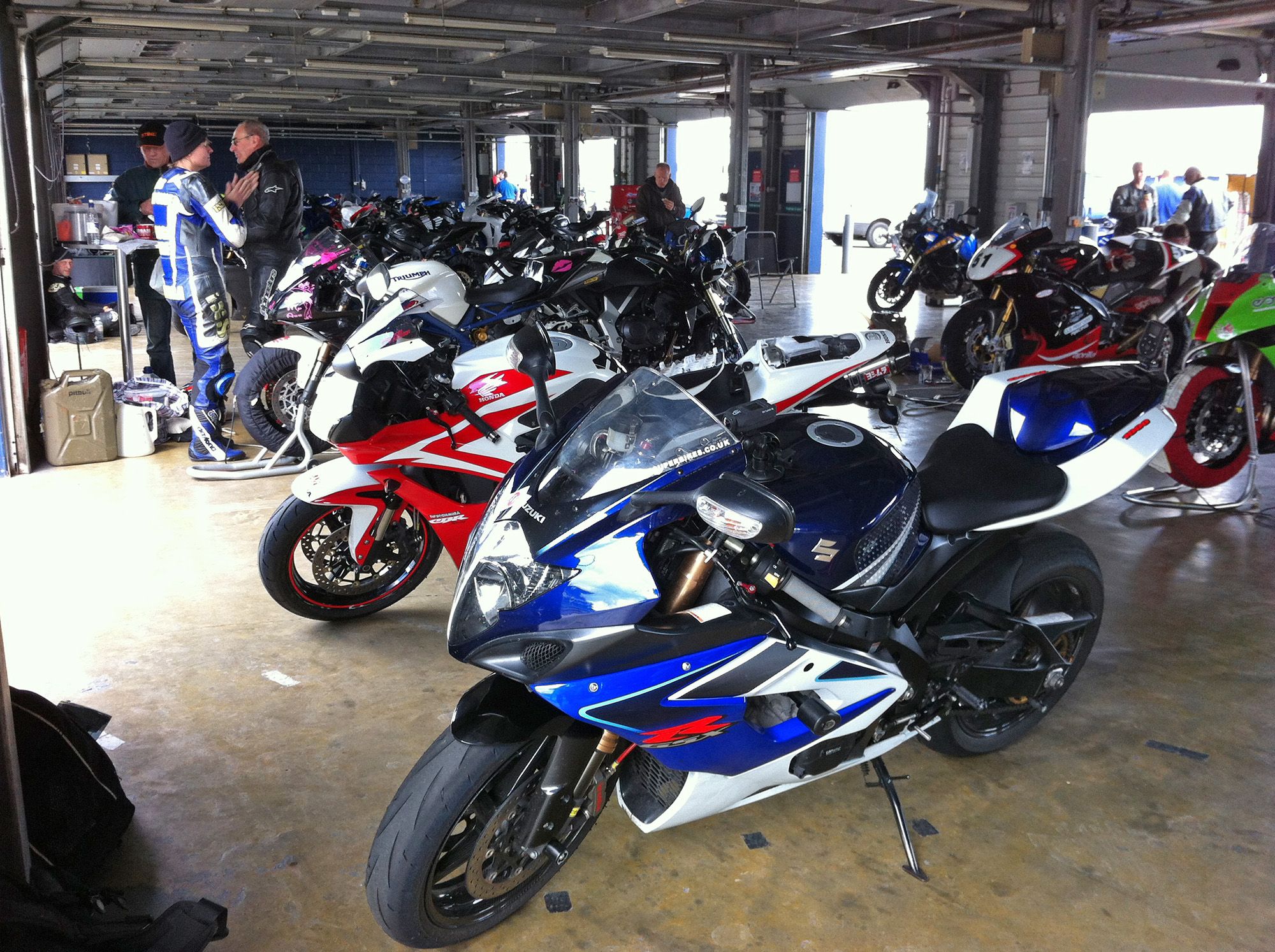 Trackday Pit Garage full of motorcycles