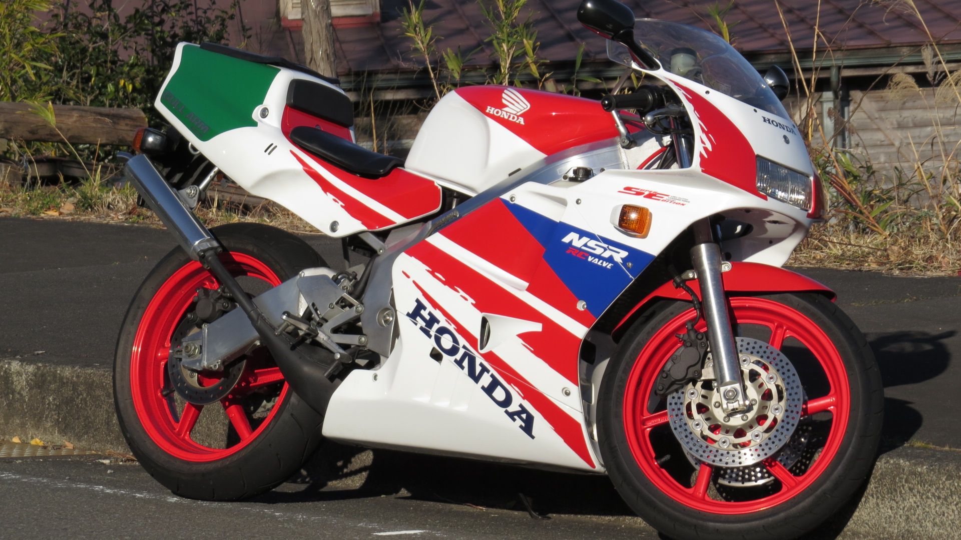 Honda NSR250 in white and red