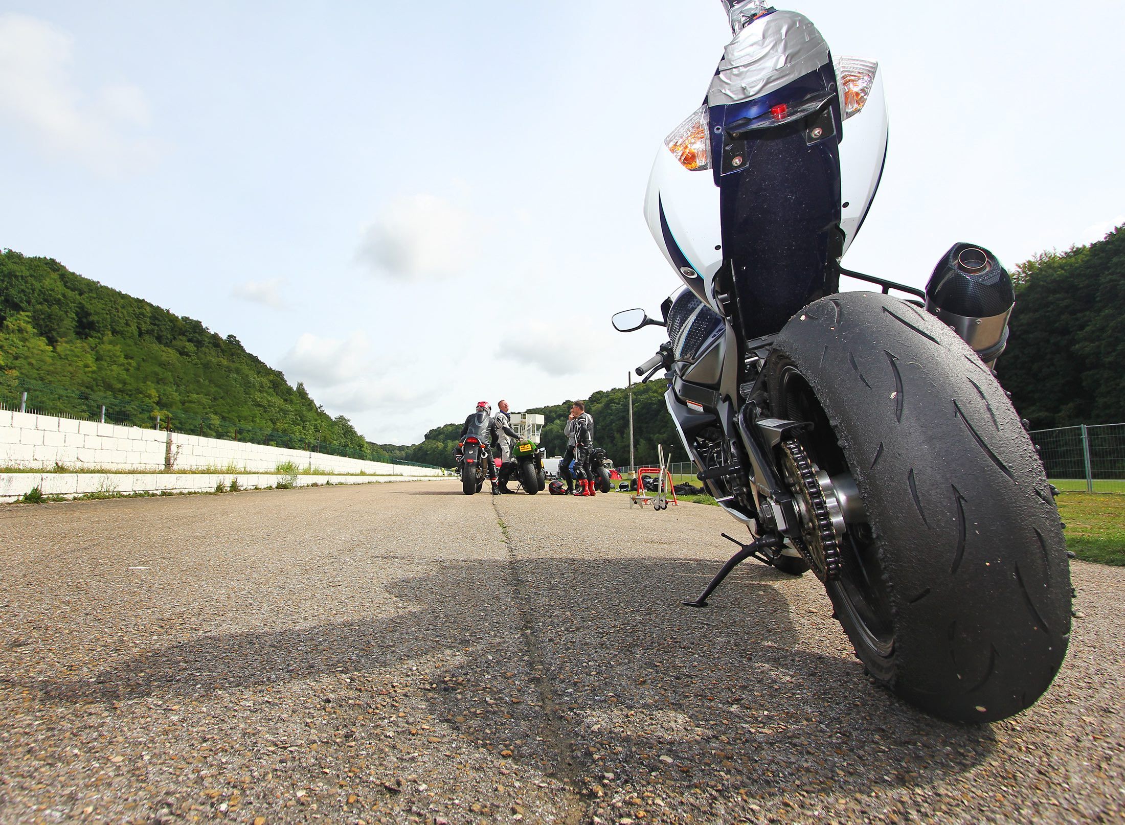 Rear view of motorcycle showing tyre wear
