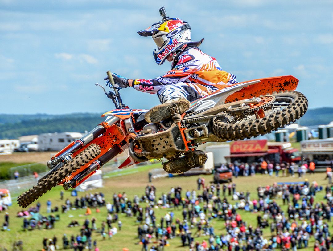 KTM 250 SX-F jumping in mid air