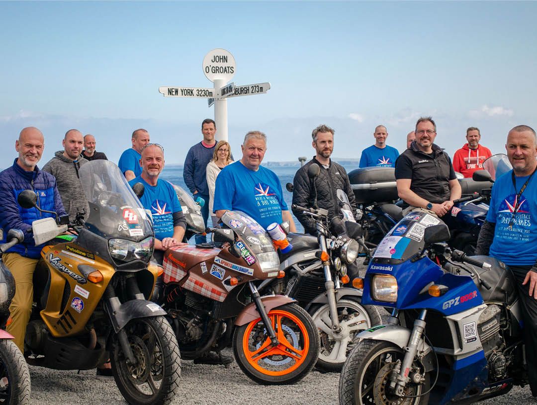 Longest Day Challenge team photo at John O'Groats