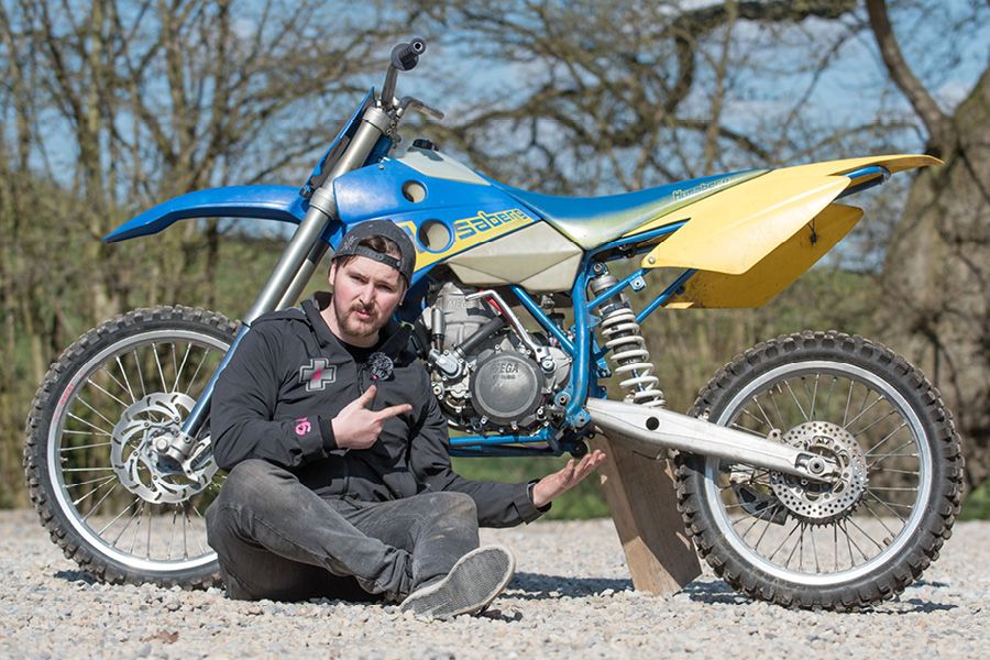Max Hinds sat with the 700cc Megalodon 2-stroke dirt bike