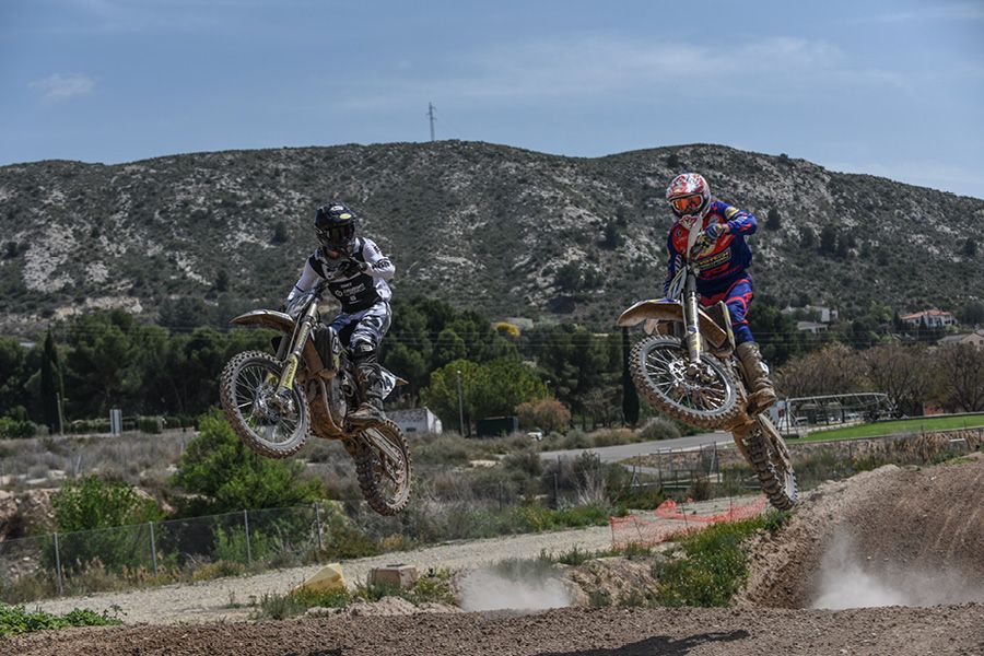 Two motocross bikes mid air