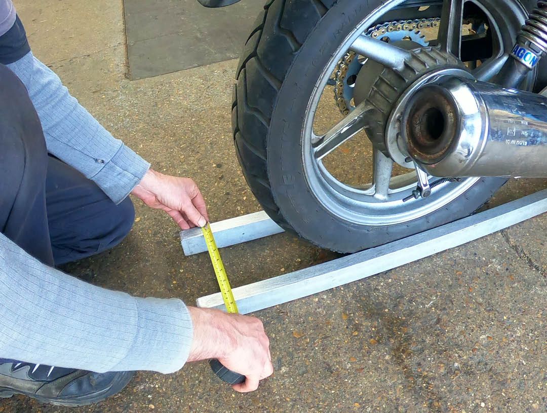 Checking a motorcycle wheel alignment