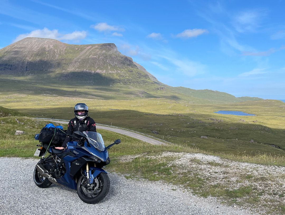 R1Liz Suzuki GSXS-1000GT with mountains in the background