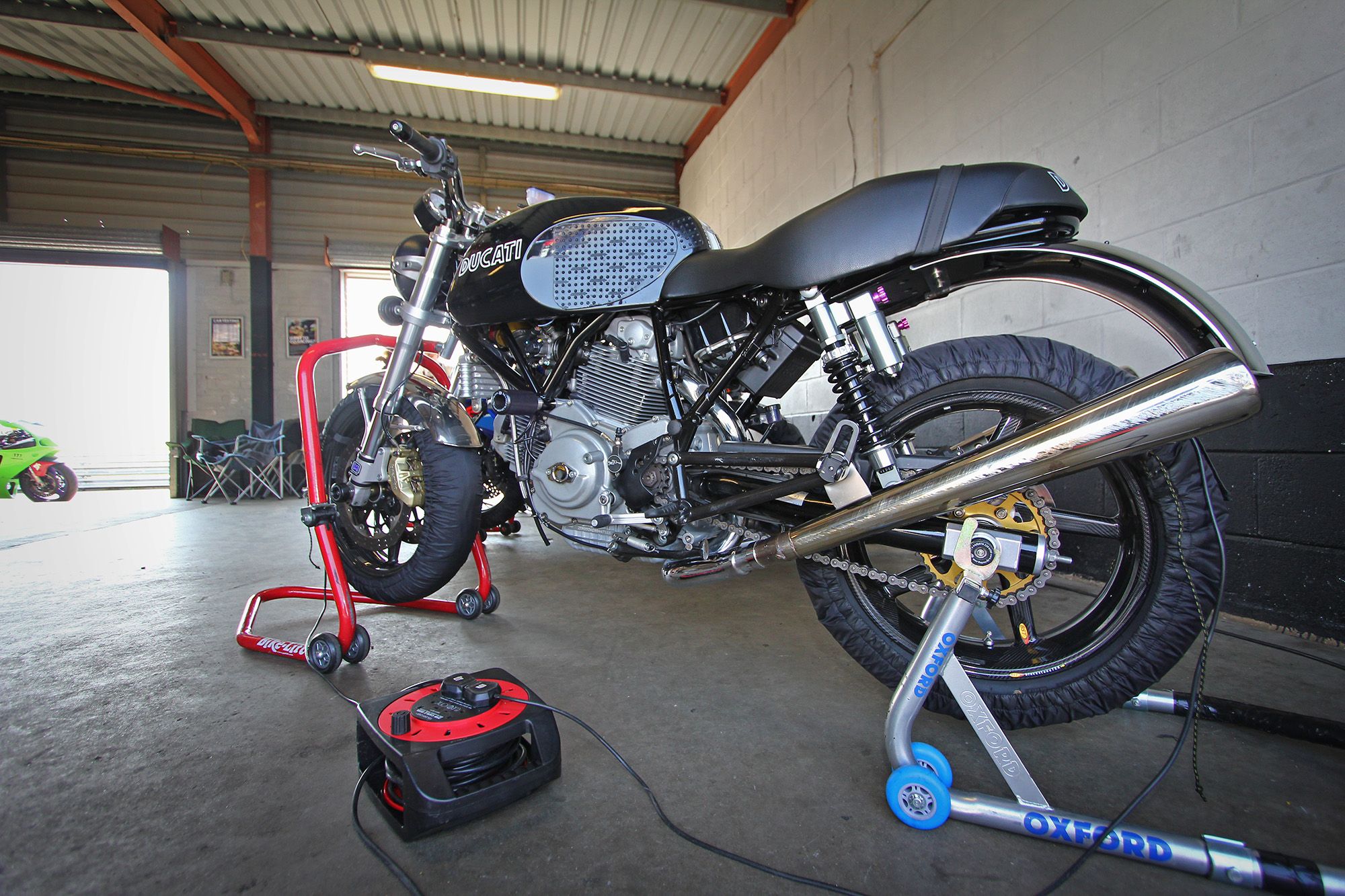 Ducati motorbike in a garage at a trackday