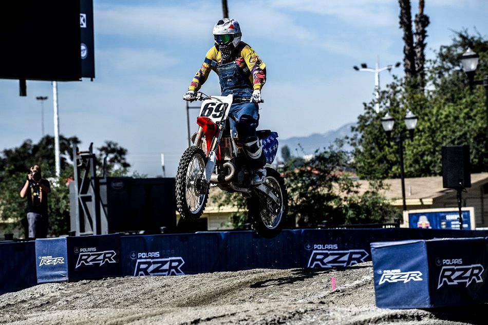 Ronnie Mac jumping a dirt bike