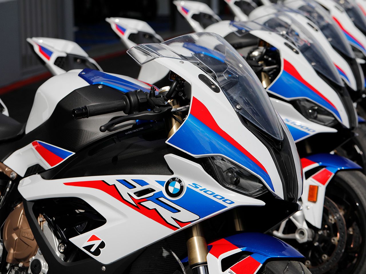 Row of 2019 BMW S1000RR motorbikes