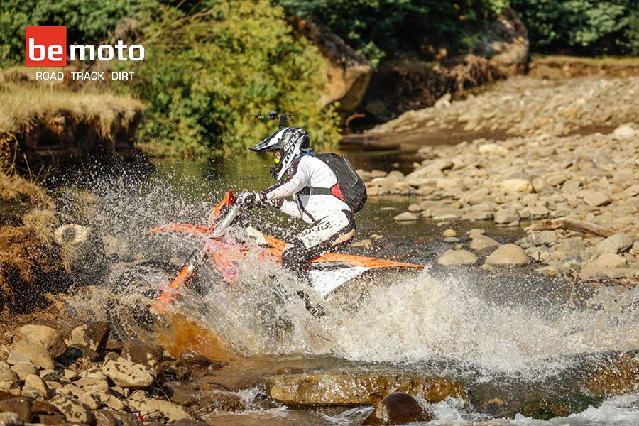 2024 KTM EXC riding through a stream