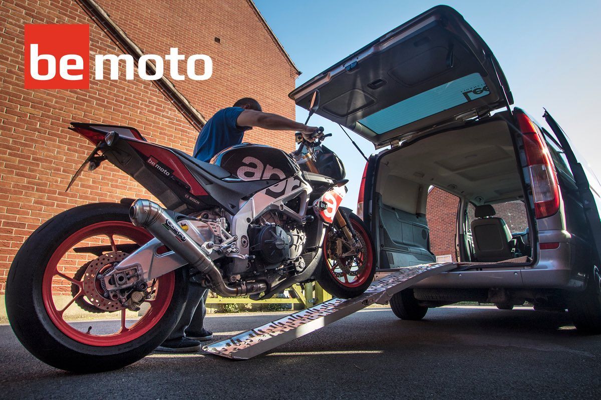 Aprilia Tuono being loaded into a race van