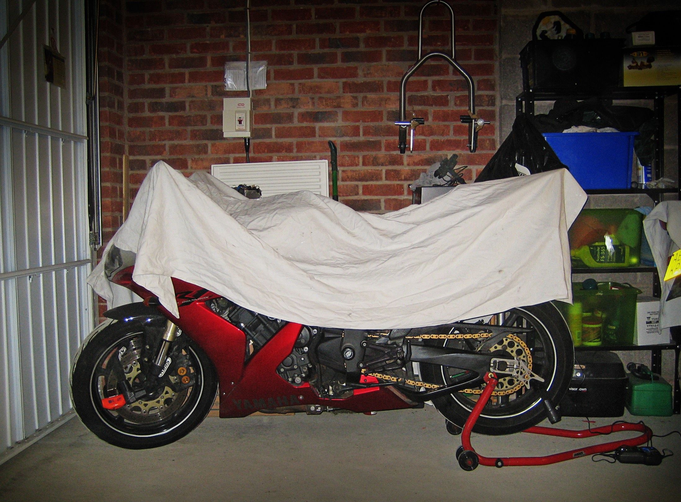 SORN motorbike under covers in the garage