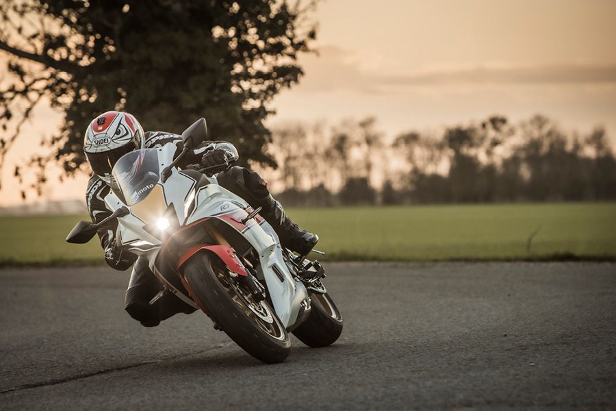 Yamaha R7 with lights on riding into a corner