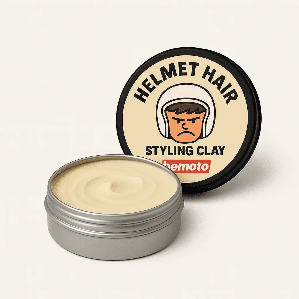Tin of BeMoto helmet hair styling clay with illustrated label, satirical grooming product for motorcyclists dealing with post ride helmet hair.