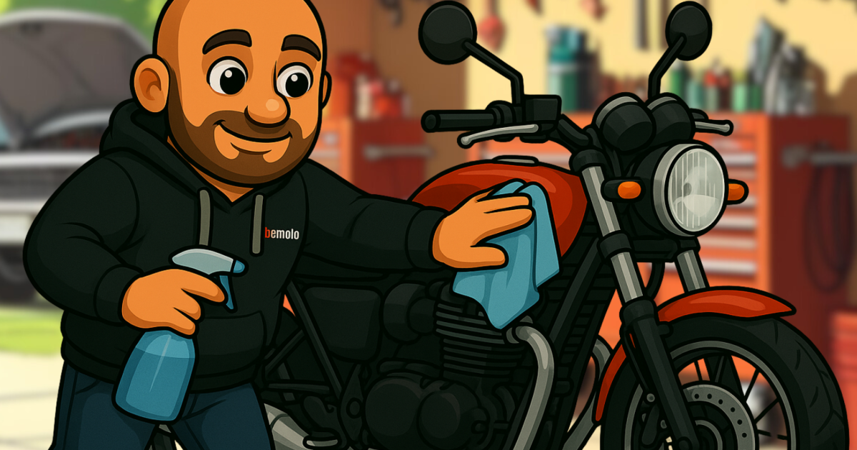 Motorbike Cleaning and Inspection by Motorbike Insurance Specialists, BeMoto Spanners, the cartoon BeMoto mechanic, cleaning an orange motorbike in a home garage using spray and cloth, dressed in BeMoto gear – Motorbike Insurance Specialists, BeMoto