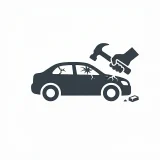 Icon of a car with a cracked windscreen being struck by a hammer.